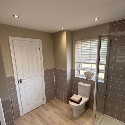 brown bathroom  - Residential